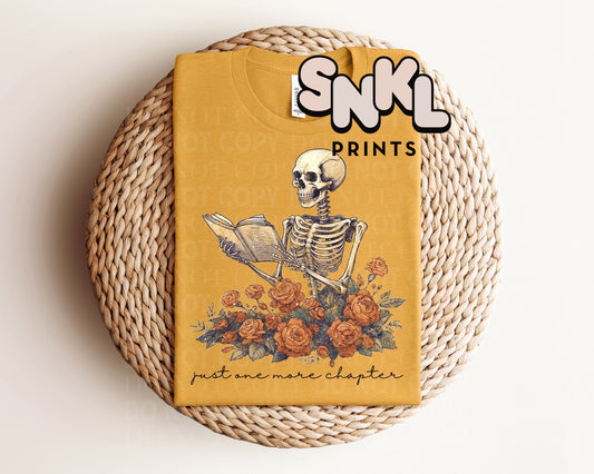 Just One More Chapter Skeleton Graphic Tee - SNKL Prints